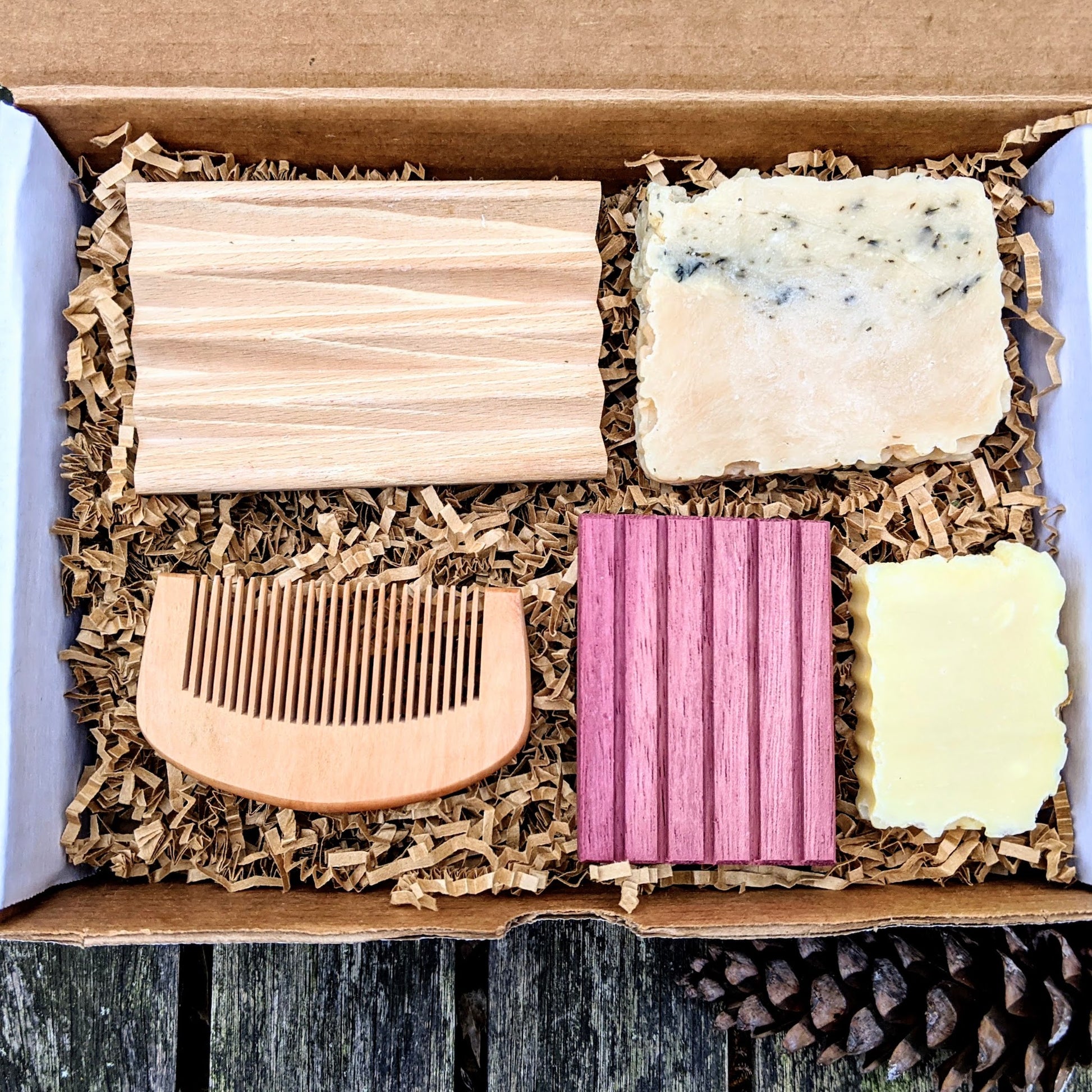 The Beard and Body box has one of our award winning soaps with a beech wood soap dish, a beard soap with a purple heart mini soap dish, and a wooden beard comb.