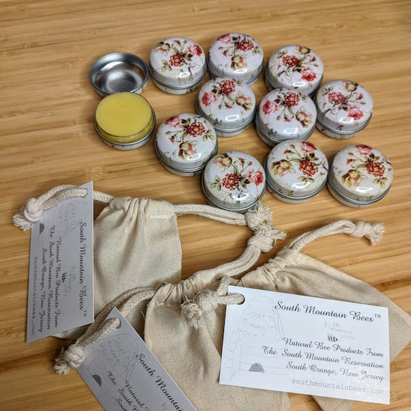Winning entries of the beeswax lip balm in charming vintage metal tins.