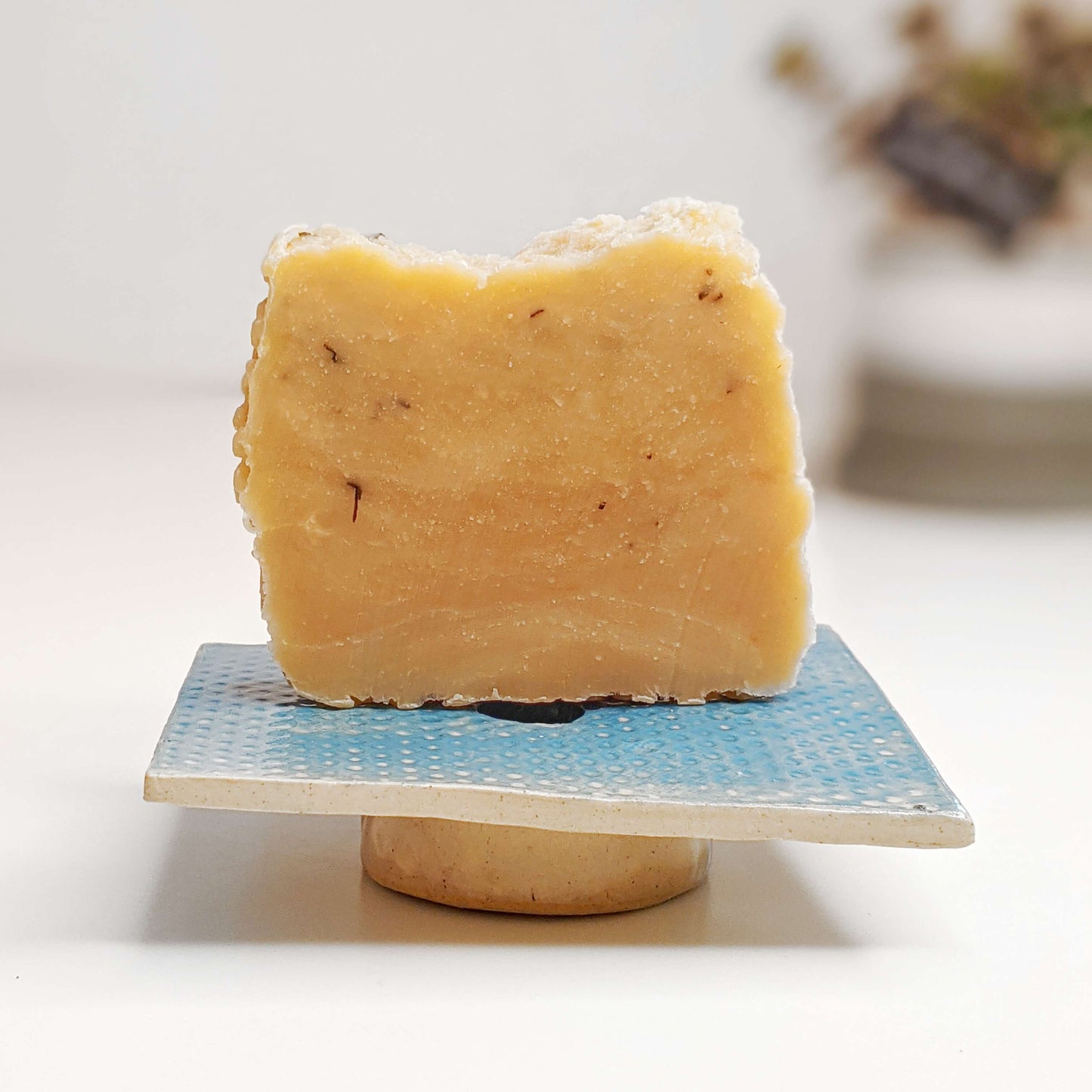 Blue water soap dish with honey soap