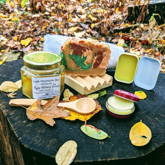 This set is inspired by the fall colors. The rosemary soap is scented with essential oil and decorated with swirls in ochre, red, green and beige. The wood dish will extend the life of your soap by letting it dry between uses. The washcloth will intensify the creamy soap lather. The honey and vitamin E scrub with bamboo spoon will gently remove dead cells and leave your skin revitalized. The beeswax lip balm and the dandelion infused salve will restore your lips and hands after being outdoors.