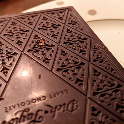 Droplets of raw honey on Dick Taylor's chocolate bar.