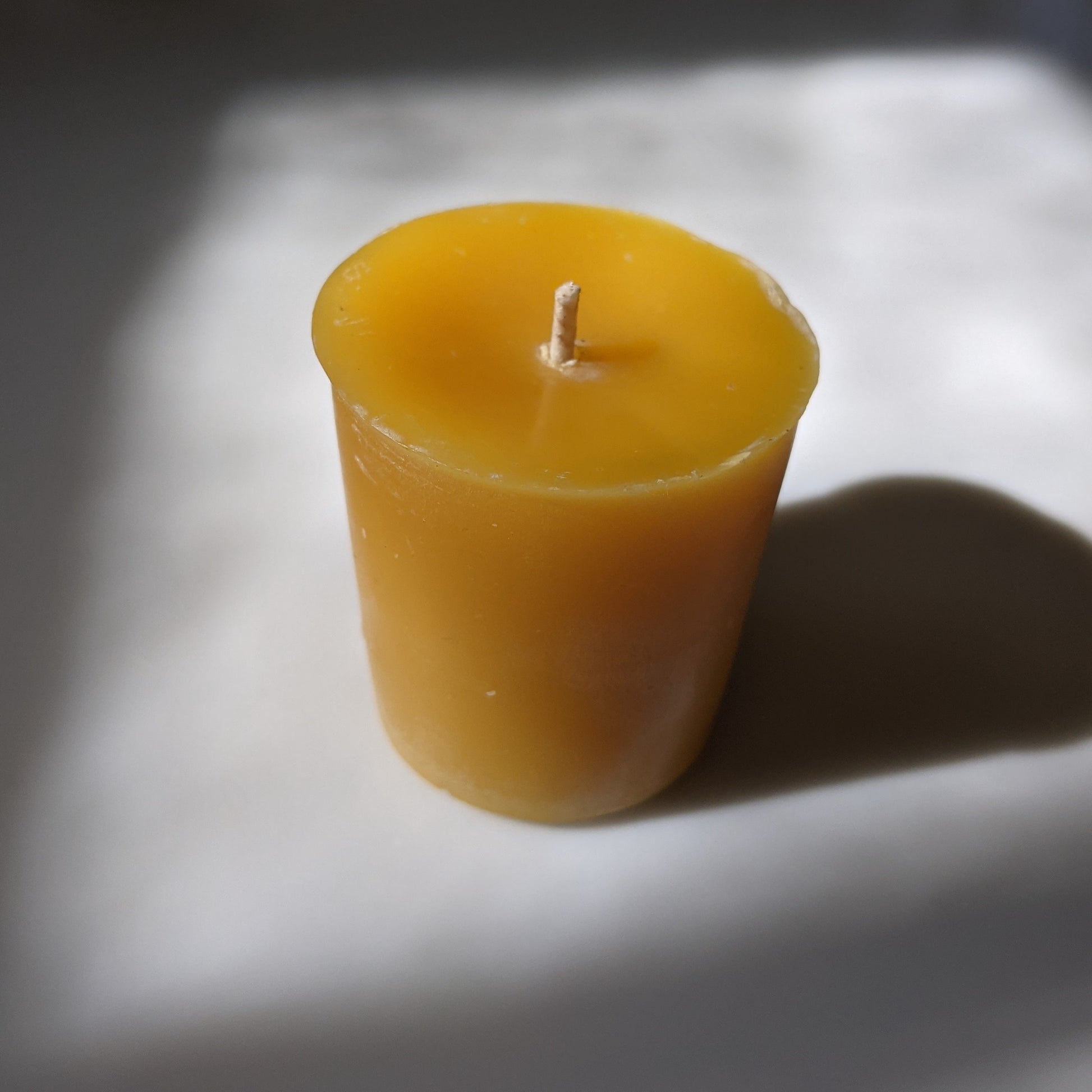 100% beeswax votive candle