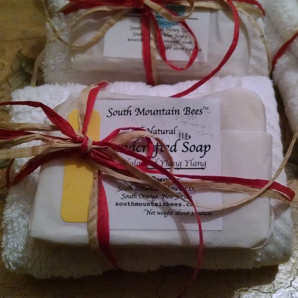 A natural honey and beeswax soap together with a soft, thick, white washcloth are the perfect couple. The soap makes a creamy lather that the washcloth intensifies offering a sensory delight, and leaving the skin renewed and moisturized.