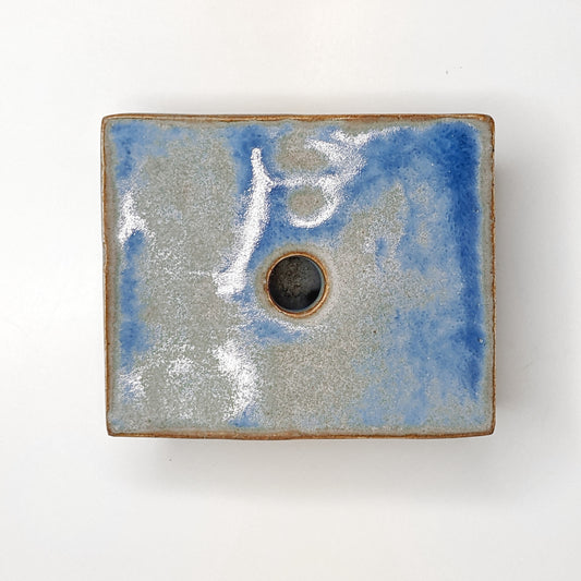 Ceramic soap dish inspired by water on earth.